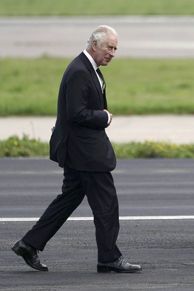 King Charles III Arriving At An Airport