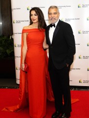 George Clooney and his wife, Amal arrive for the formal Artist's Dinner honoring the recipients of the 45th Annual Kennedy Center Honors at the Department of State in Washington, D.C. on Saturday, December 3, 2022. The 2022 honorees are: actor and filmmaker George Clooney; contemporary Christian and pop singer-songwriter Amy Grant; legendary singer of soul, Gospel, R&B, and pop Gladys Knight; Cuban-born American composer, conductor, and educator Tania Le√≥n; and iconic Irish rock band U2, comprised of band members Bono, The Edge, Adam Clayton, and Larry Mullen Jr. 
Credit: Ron Sachs / Pool via CNP

Pictured: George Clooney,Amal Clooney
Ref: SPL5507657 031222 NON-EXCLUSIVE
Picture by: Ron Sachs/CNP / SplashNews.com

Splash News and Pictures
USA: +1 310-525-5808
London: +44 (0)20 8126 1009
Berlin: +49 175 3764 166
photodesk@splashnews.com

World Rights, No France Rights