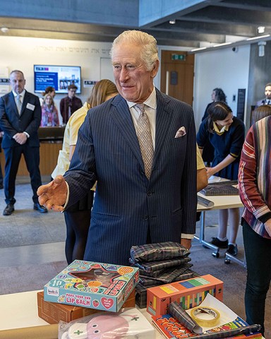 As the Jewish community prepares to celebrate Chanukah, His Majesty King Charles III visited JW3, a Jewish community centre that is open to all faiths and acts as a hub for the arts, culture, social action and learning in North London. Founded by Dame Vivien Duffield DBE, JW3 opened in October 2013 with a vision of a vibrant, diverse, unified British-Jewish community, inspired by and engaged with Jewish arts, culture, learning and life. King Charles III watched local school girls wrap presents
King Charles III visits JW3 Jewish Community Centre, London, UK - 16 Dec 2022