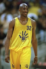 Newly-acquired Los Angeles Laker Kobe Bryant walks downcourt during a summer league game against the Detroit Pistons in Long Beach, Calif., on
Kobe Bryant, Long Beach, USA