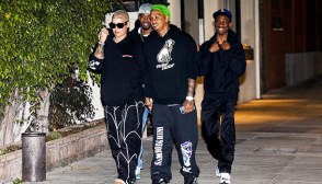 Amber Rose & A.E. holding hands while out to dinner