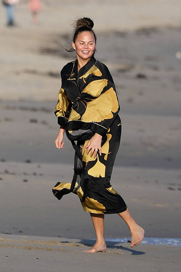 Chrissy Teigen on the beach