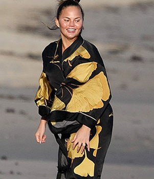 Chrissy Teigen at the beach