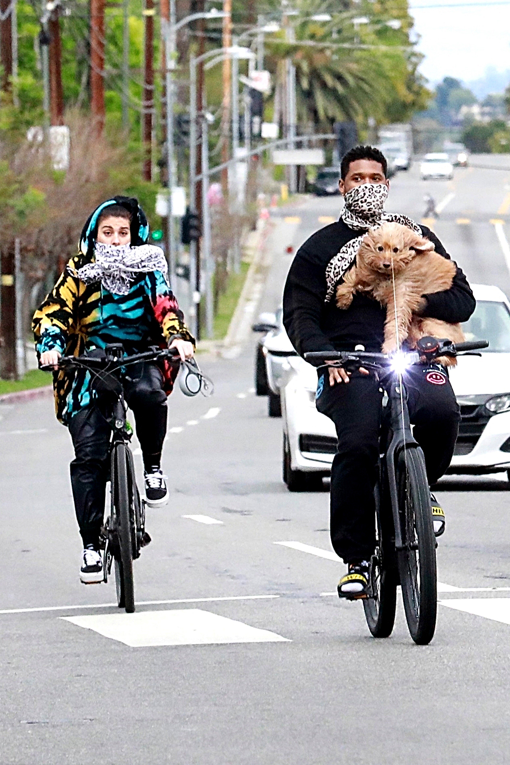 *EXCLUSIVE* Usher and Jennifer Goicoechea take their dog on a Bike Ride