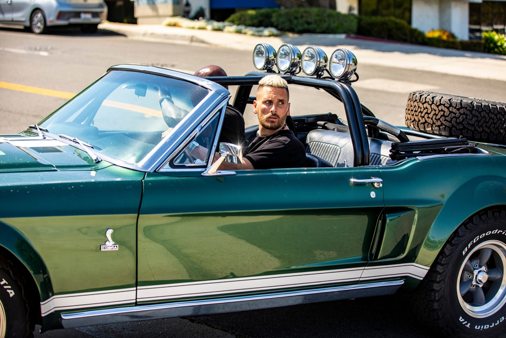 *EXCLUSIVE* Scott Disick trying hard to keep up with Travis Barker bad boy image sports a Mull-hawk, and a Mustang while buying a Motorcycle