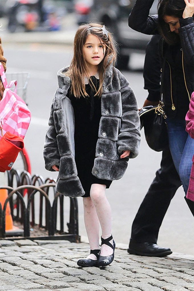 Suri Cruise Dons A Plush Coat