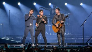 Jonas Brothers performing on stage