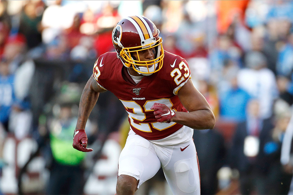 Washington Redskins cornerback Quinton Dunbar is seen in pursuit of a Detroit Lions player during the second half of an NFL football game, in Landover, Md
Lions Redskins Football, Landover, USA - 24 Nov 2019