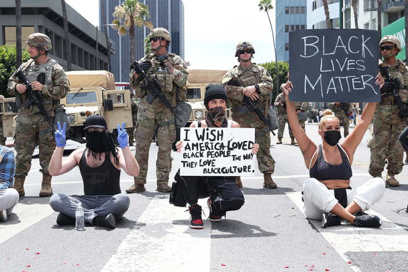 Los Angeles, CA  - *EXCLUSIVE*  - Singer Madison Beer crouches down on the front lines of today's Black Lives Matter protest and peacefully protest with the National Guard behind her.

Pictured: Madison Beer

BACKGRID USA 2 JUNE 2020 

BYLINE MUST READ: 3 / BACKGRID

USA: +1 310 798 9111 / usasales@backgrid.com

UK: +44 208 344 2007 / uksales@backgrid.com

*UK Clients - Pictures Containing Children
Please Pixelate Face Prior To Publication*