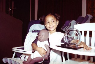 Symone Raven Symone, the four-year-old actress on "The Cosby Show," demonstrates safety features of doll furniture during a press conference at the Plaza Hotel in New York
PEOPLE SYMONE 1990, NEW YORK, USA