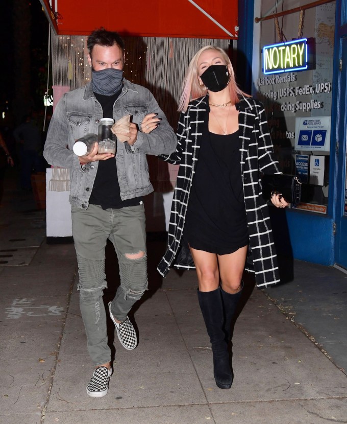 Brian Austin Green & Sharna Burgess walking Outside Of Tina Louise’s New Restaurant