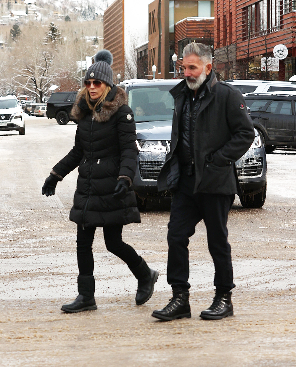 *EXCLUSIVE* Lori Loughlin and her husband Mossimo Giannulli enjoy a stroll and some shopping at Louis Vuitton in Aspen