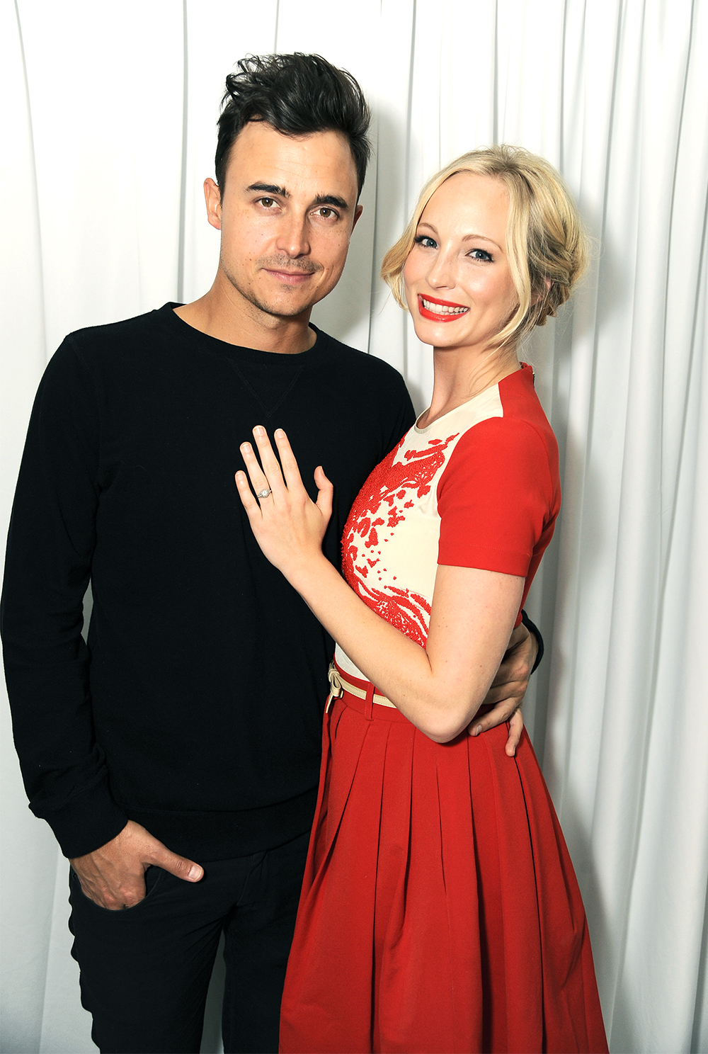 From left, Joe King and Candice Accola arrive at The Hollywood Reporter celebration of the Emmy nominees and new fall TV season presented by Samsung Galaxy, Asos, Porsche, Pandora and Ketel One, on Thursday, Sept. 19, 2013, at Soho House in West Hollywood, Calif. (Photo by Jordan Strauss/Invision for THR/AP Images)