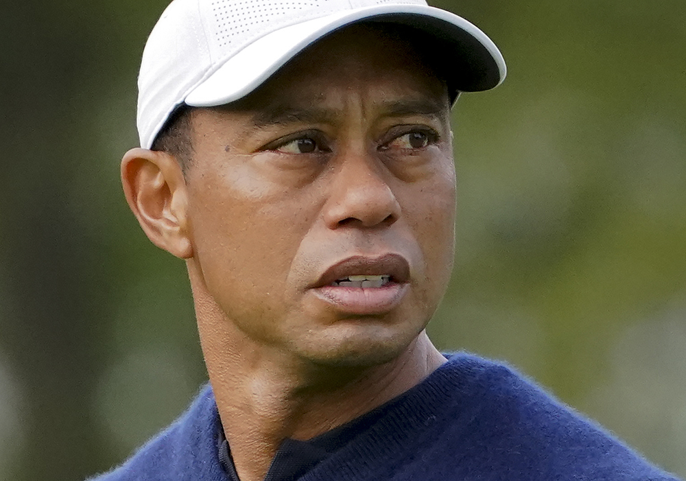 Tiger Woods, of the United States, prepares to play his shot from the third tee during the first round of the US Open Golf Championship, Thursday, Sept. 17, 2020, in Mamaroneck, N.Y. (AP Photo/John Minchillo)