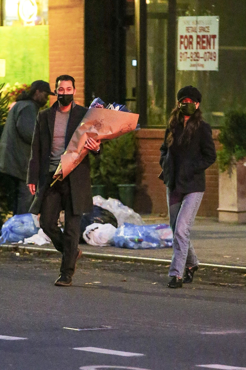 *EXCLUSIVE* Katie Holmes stops to buy flowers with Emilio Vitolo Jr.