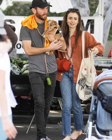 Los Angeles, CA  - *EXCLUSIVE*  - Look out Charlie, Lily Collins has a new man in her life! Ok, maybe not quite - looks like Lily Collins has a brand new puppy and she was happy to show him off while shopping at the Farmers Market with boyfriend Charlie McDowell.

Pictured: Lily Collins, Charlie McDowell

BACKGRID USA 2 FEBRUARY 2020 

BYLINE MUST READ: LESE / BACKGRID

USA: +1 310 798 9111 / usasales@backgrid.com

UK: +44 208 344 2007 / uksales@backgrid.com

*UK Clients - Pictures Containing Children
Please Pixelate Face Prior To Publication*