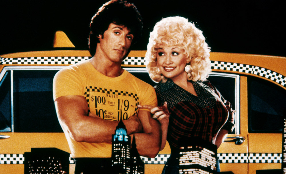 RHINESTONE, from left: Sylvester Stallone, Dolly Parton, 1984, TM & Copyright © 20th Century Fox fil