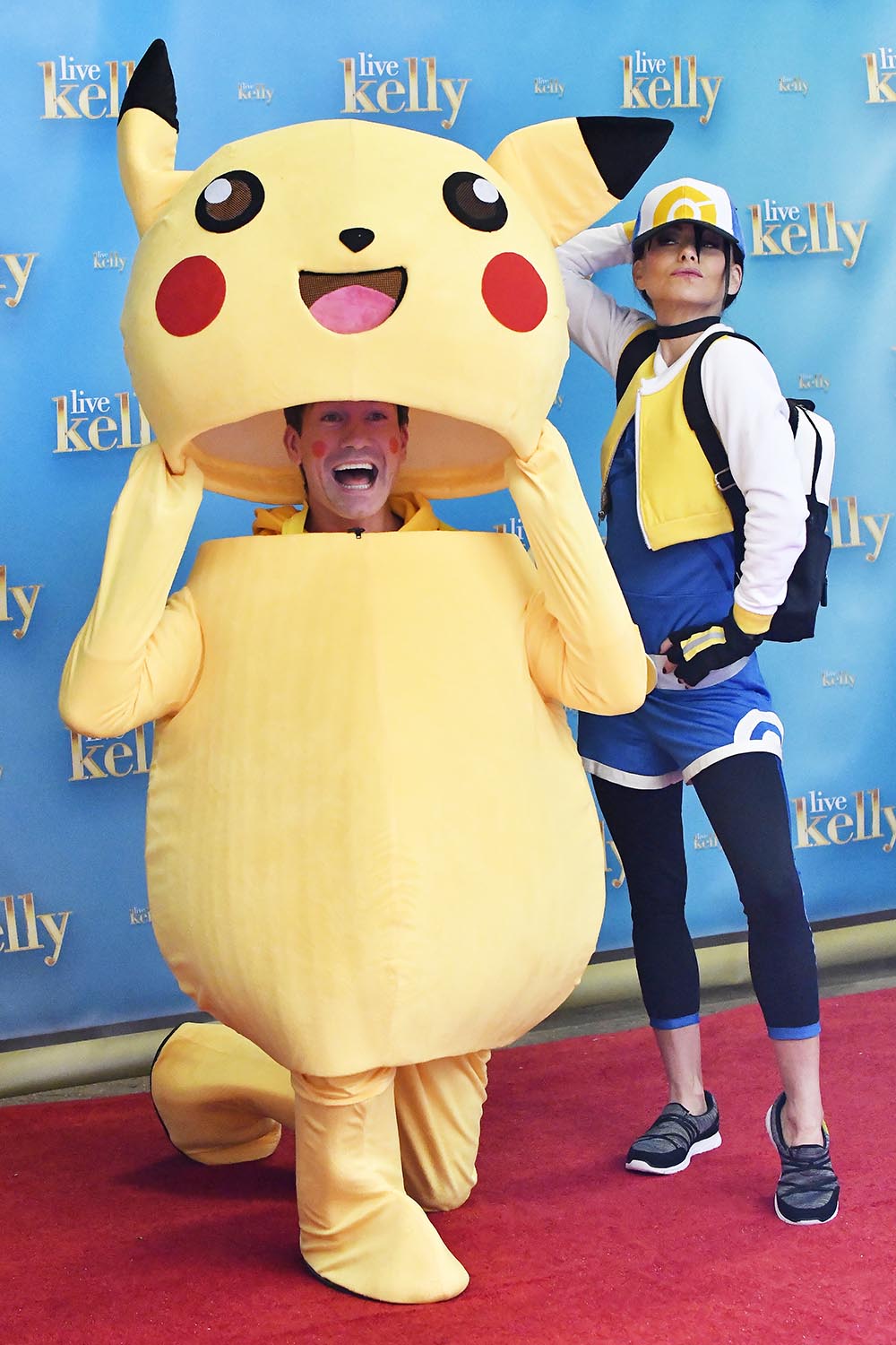 Kelly Ripa and Jerry O'Connell dress up as Picachu and Ash at the Live with Kelly Halloween show in New York City