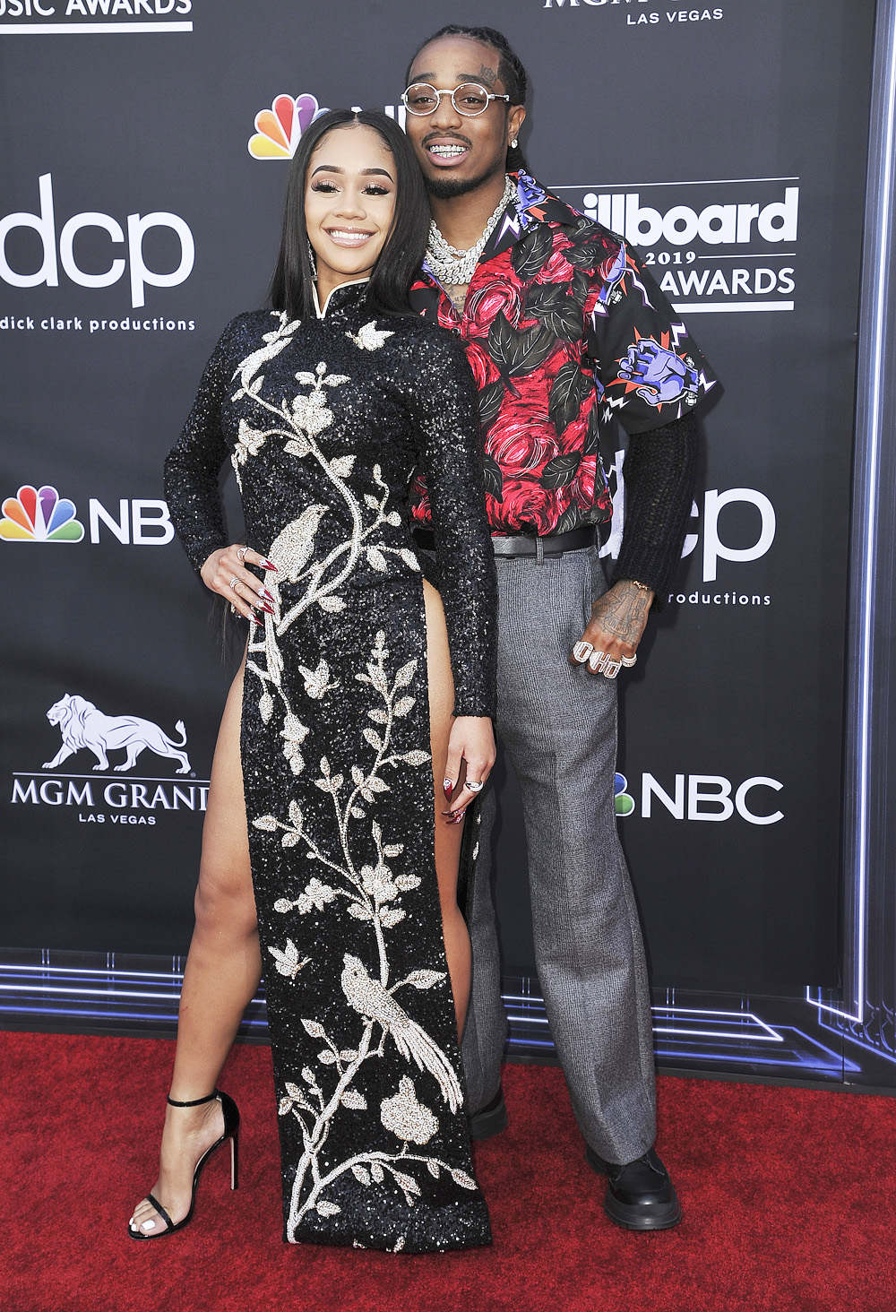 Saweetie, left, and Quavo arrive at the Billboard Music Awards on Wednesday, May 1, 2019, at the MGM Grand Garden Arena in Las Vegas. (Photo by Richard Shotwell/Invision/AP)