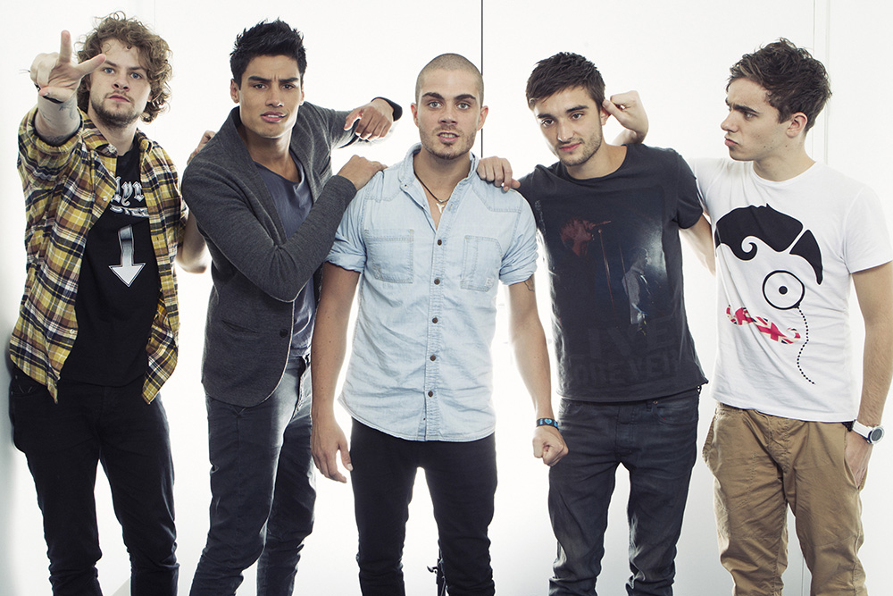 This Aug. 22, 2012 photo shows members of the British boy band "The Wanted", from left, Jay McGuiness, Siva Kaneswaran, Max George, Tom Parkerand Nathan Sykes posing for a portrait at JetBlue's T5 at JFK International Airport in New York. The Wanted, who had a hit this year with the party jam “Glad You Came,” are up against fellow brish band One Direction, Canadian sensation Carly Rae Jepsen, R&B singer Frank Ocean and pop-rockers fun. for best new artist at the MTV Video Music Awards on Sept. 6.  (Photo by Victoria Will/Invision/AP)