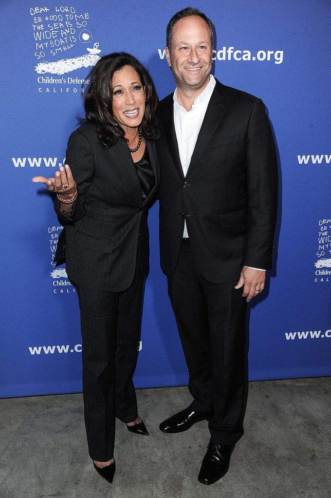 Kamala Harris poses next to Douglas Emhoff