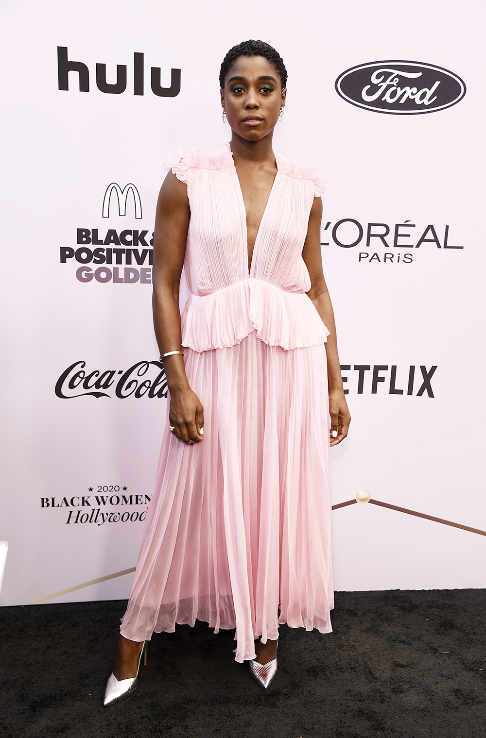 Actress Lashana Lynch poses at the 13th Annual ESSENCE Black Women in Hollywood Awards Luncheon, Thursday, Feb. 6, 2020, in Beverly Hills, Calif. (AP Photo/Chris Pizzello)