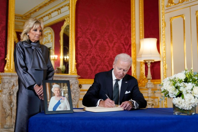 Joe Biden signs the book of condolences