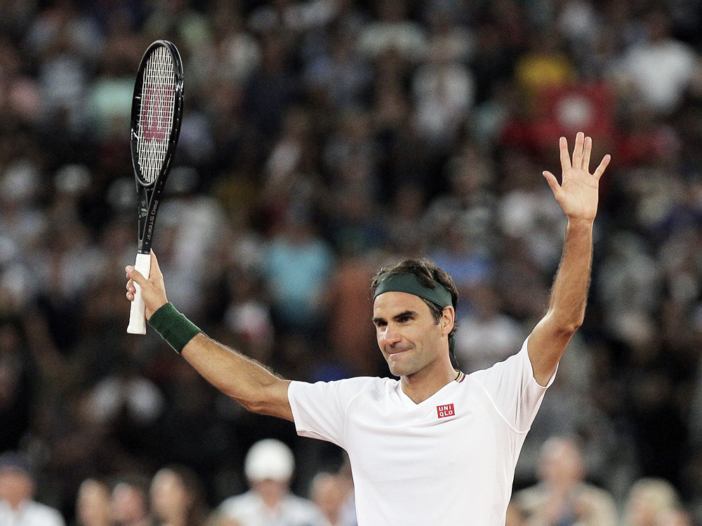 Roger Federer thanks the crowd after winning 3 sets to 2 against Rafael Nadal in their exhibition tennis match held at the Cape Town Stadium in Cape Town, South Africa, Friday Feb. 7, 2020. (AP Photo/Halden Krog)