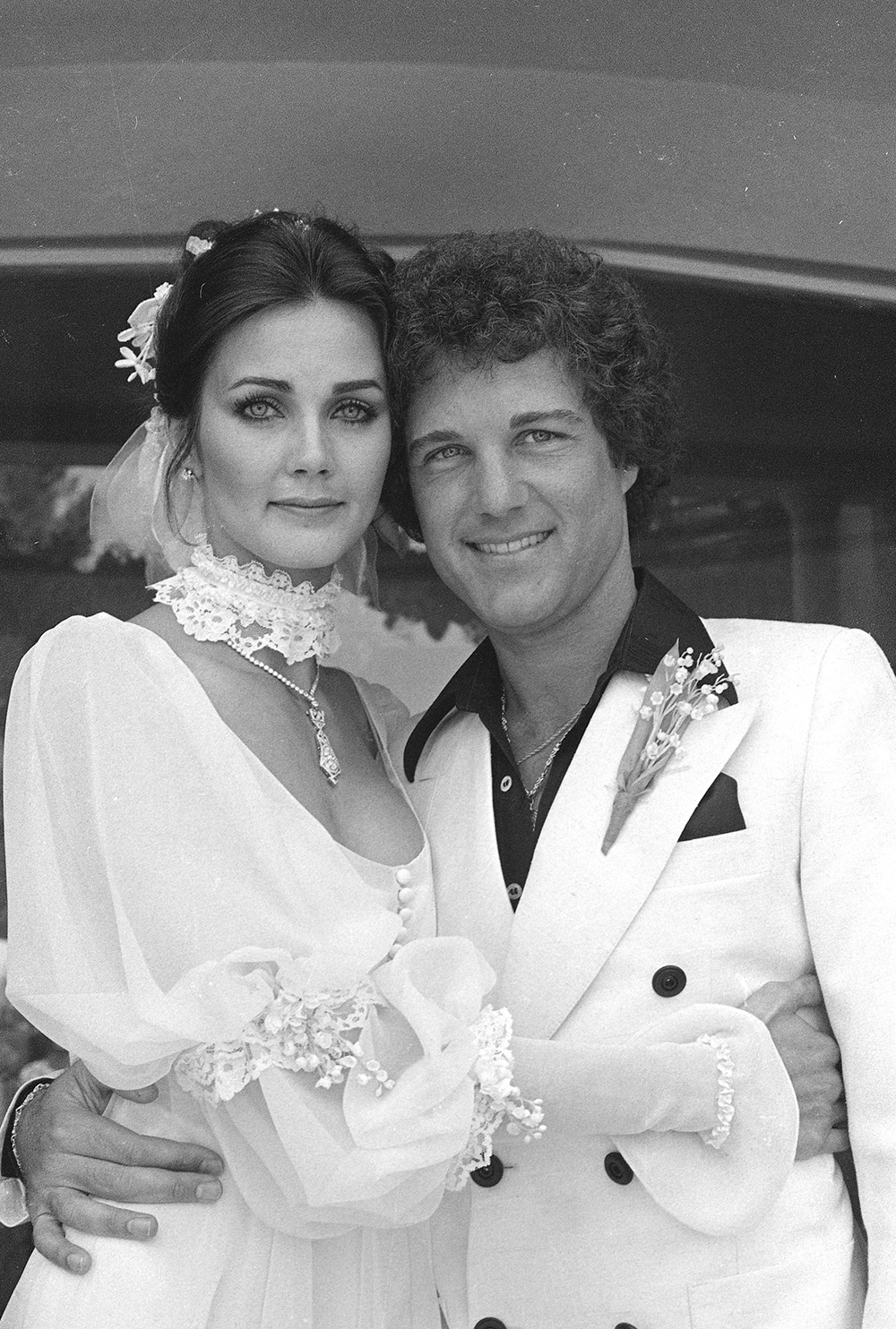 Actress Lynda Carter poses with her husband, Hollywood producer and manager Ron Samuels, following their wedding ceremony in Beverly Hills, Ca., May 28, 1977.  (AP Photo)