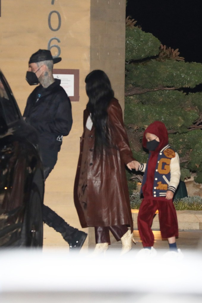 Kourtney Kardashian Hold Son Reign By The Hand