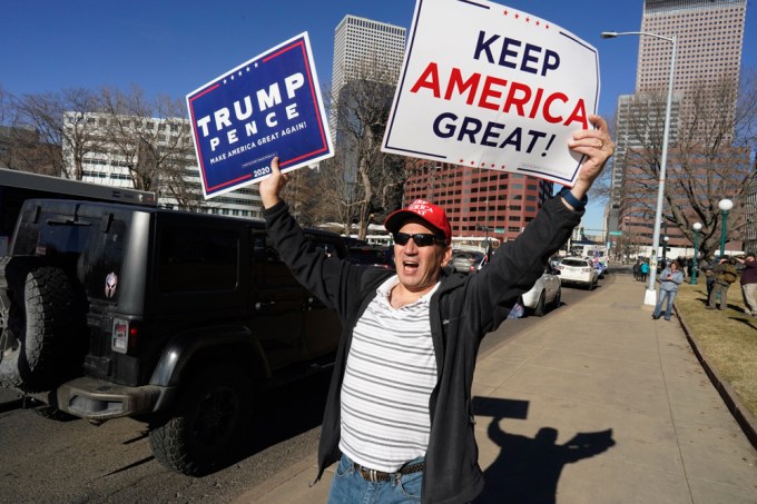 A Protester Waving Cards