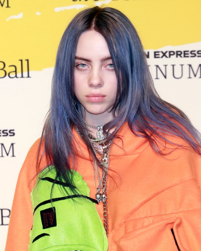 Billie Eilish rocks purple hair at the 2018 Yellow Ball