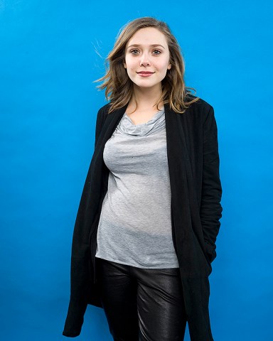 Elizabeth Olsen from the films "Martha Marcy May Marlene" and "Silent House" poses for a portrait in the Fender Music Lodge during the 2011 Sundance Film Festival on Saturday, Jan. 22, 2011 in Park City, Utah.   (AP Photo/Victoria Will)