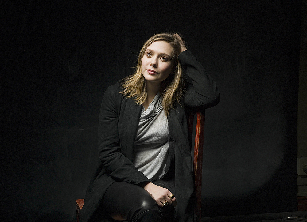 Elizabeth Olsen from the films "Martha Marcy May Marlene" and "Silent House" poses for a portrait in the Fender Music Lodge during the 2011 Sundance Film Festival on Saturday, Jan. 22, 2011 in Park City, Utah.   (AP Photo/Victoria Will)