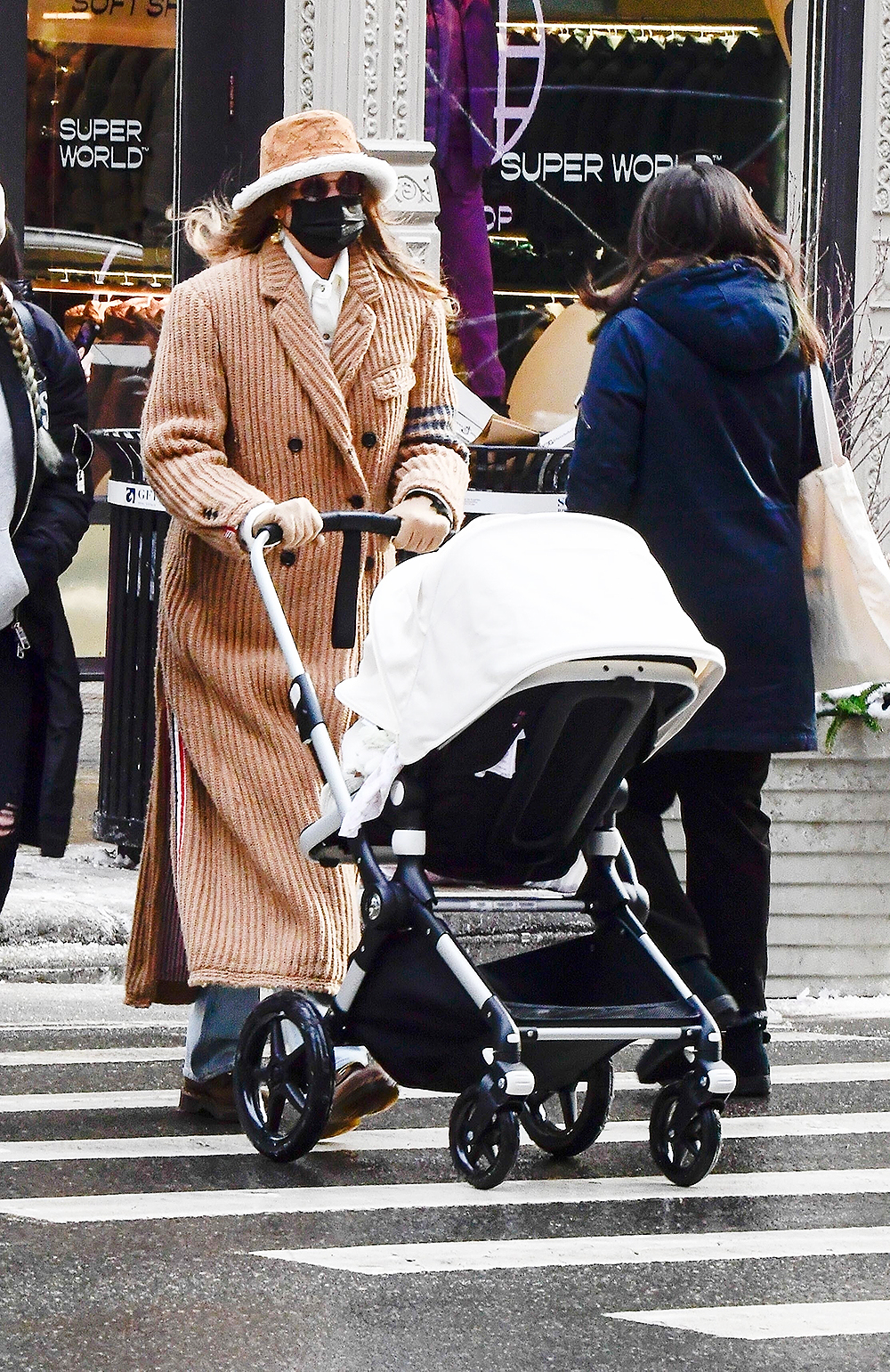 New York, NY - Gigi Hadid looks stylish in a Louis Vuitton bucket hat as she steps out for an afternoon walk with her baby daughter.Pictured: Gigi HadidBACKGRID USA 19 DECEMBER 2020 USA: +1 310 798 9111 / usasales@backgrid.comUK: +44 208 344 2007 / uksales@backgrid.com*UK Clients - Pictures Containing ChildrenPlease Pixelate Face Prior To Publication*