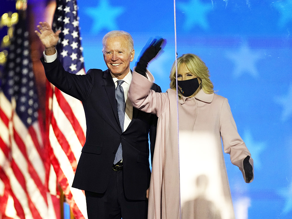 Democratic presidential candidate former Vice President Joe Biden arrives with his wife Jill Biden to speak to supporters Wednesday, Nov. 4, 2020, in Wilmington, Del. (AP Photo/Andrew Harnik)