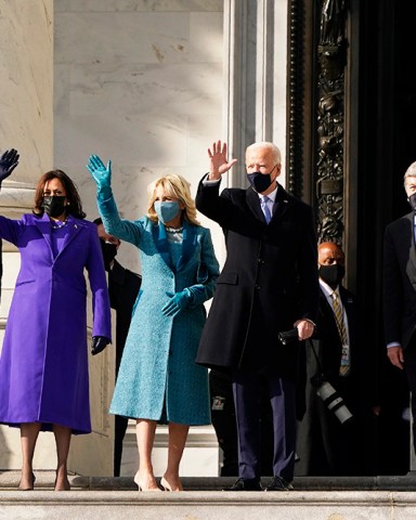 President-elect Joe Biden, his wife Jill Biden and Vice President-elect Kamala Harris and her husband Doug Emhoff arrive at the steps of the U.S. Capitol for the start of the official inauguration ceremonies, in Washington, Wednesday, Jan. 20, 2021. (AP Photo/J. Scott Applewhite)