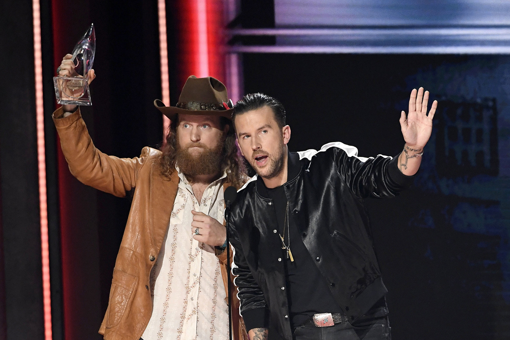 14 November 2018 - Nashville, Tennessee - John Osborne, J.T. Osborne, The Brothers Osbourne. 52nd Annual CMA Awards, Country Music's Biggest Night, held at Bridgestone Arena. Photo Credit: Laura Farr/AdMedia/Sipa USA(Sipa via AP Images)