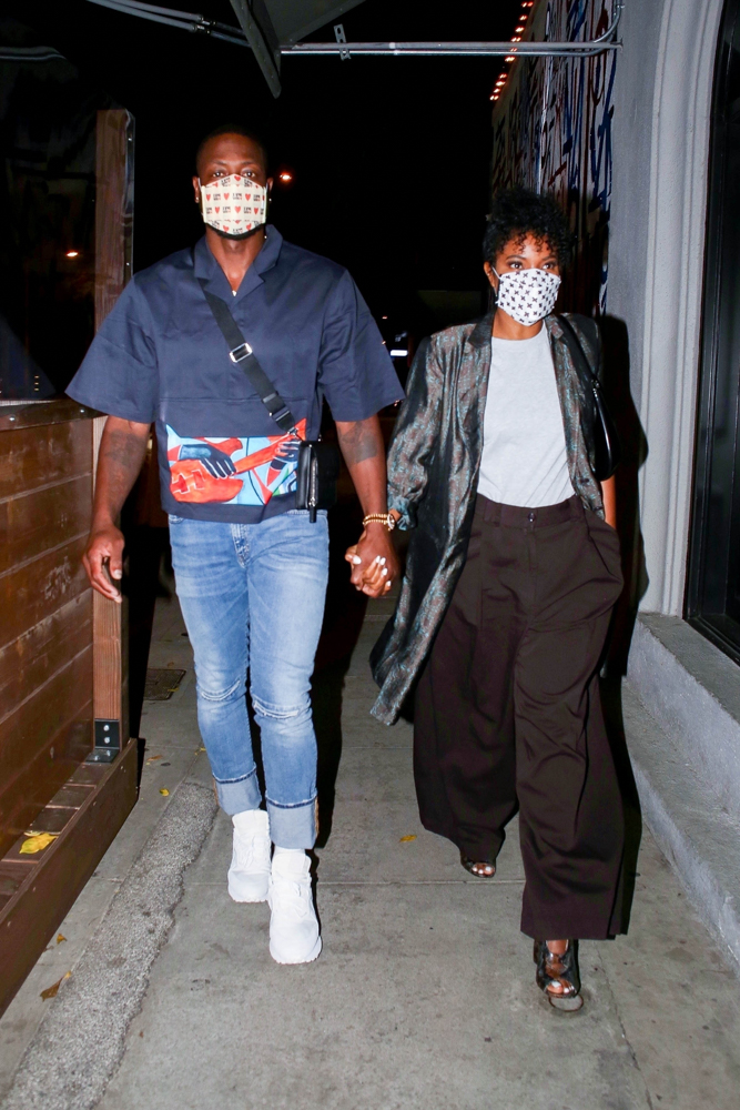 Dwyane Wade & Gabrielle Union holding hands