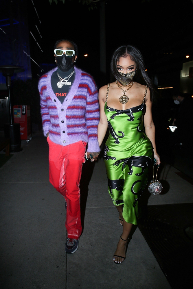 Quavo & Saweetie hold hands