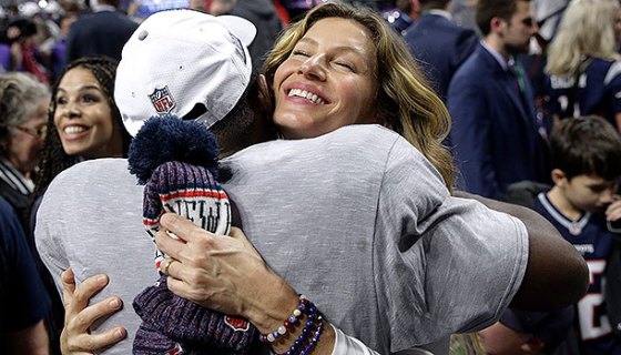Gisele Bundchen & Tom Brady Hugging at the Super Bowl