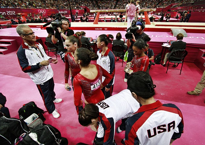 John Geddert gives a pep talk to his Olympic team