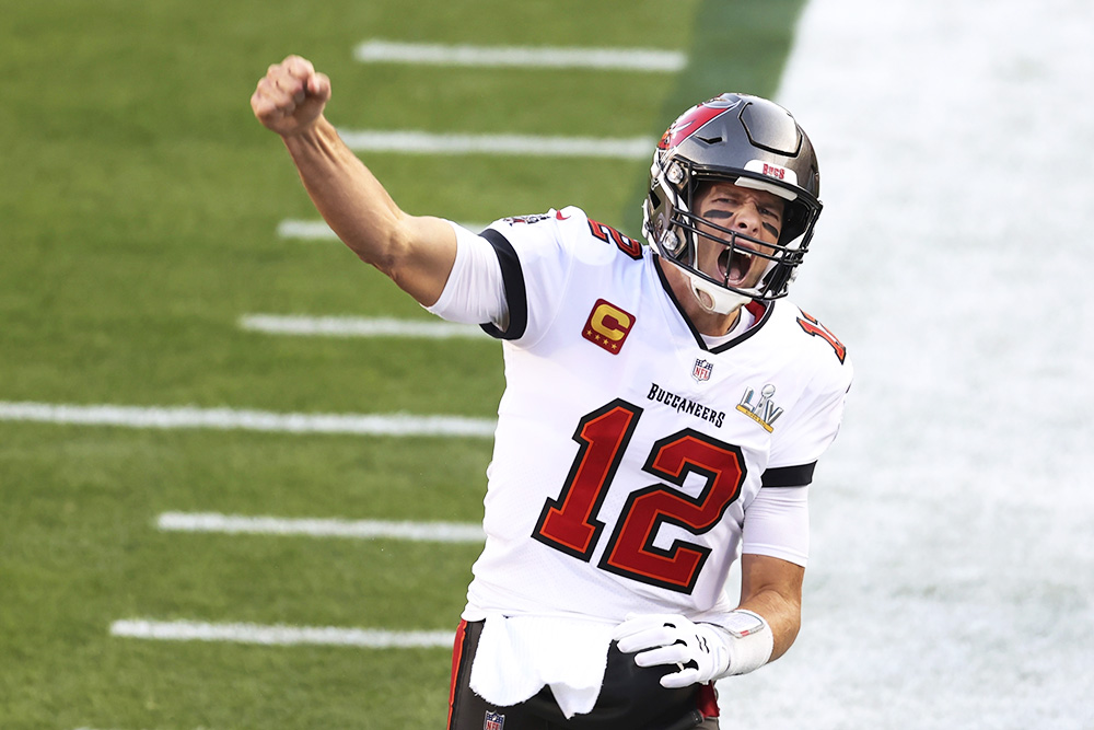 Tampa Bay Buccaneers quarterback Tom Brady shouts after running on to the field before the NFL Super Bowl 55 football game between the Kansas City Chiefs and Tampa Bay Buccaneers, Sunday, Feb. 7, 2021, in Tampa, Fla. (AP Photo/Mark LoMoglio)