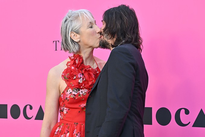 Alexandra and Keanu share a kiss