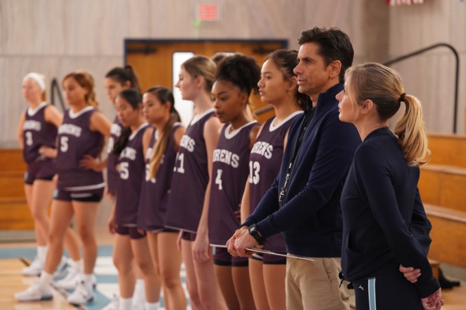 John Stamos & Jessalyn Gilsig With The Team