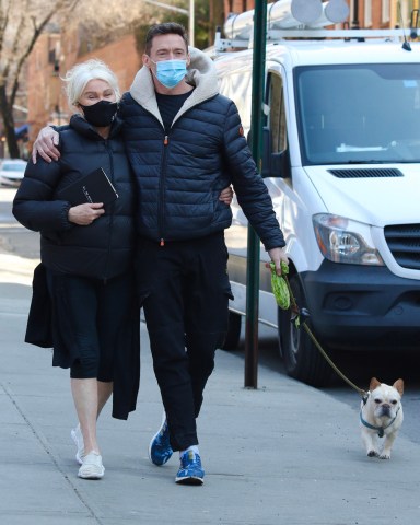 Hugh Jackman and Deborra-Lee Furness are all smiles while out with their dog Dali around Manhattan’s Downtown area. 10 Mar 2021 Pictured: Hugh Jackman and Deborra-Lee Furness. Photo credit: LRNYC / MEGA TheMegaAgency.com +1 888 505 6342 (Mega Agency TagID: MEGA738569_001.jpg) [Photo via Mega Agency]