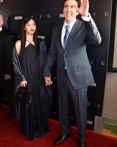 Riko Shibata, left, and Nicolas Cage arrive at the Los Angeles premiere of "Pig", at the Nuart Theatre
Premiere of "Pig", Los Angeles, United States - 13 Jul 2021