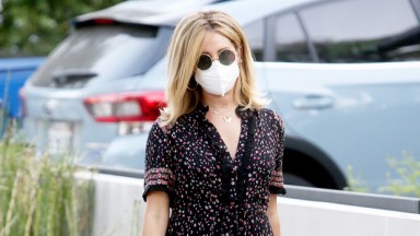 Ashley Tisdale wearing a flowy maxi dress