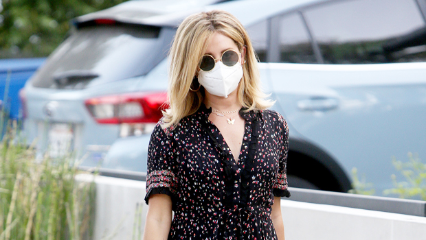 Ashley Tisdale wearing a flowy maxi dress
