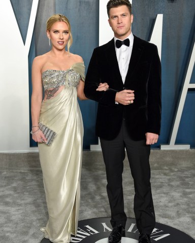 Scarlett Johansson, Colin Jost. Actor Scarlett Johansson, left, and fiancé Colin Jost arrive at the Vanity Fair Oscar Party, in Beverly Hills, Calif
92nd Academy Awards - Vanity Fair Oscar Party, Beverly Hills, USA - 09 Feb 2020